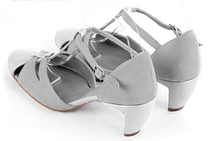 Light silver and pearl grey women's T-strap open side shoes. Round toe. Medium comma heels. Rear view - Florence KOOIJMAN